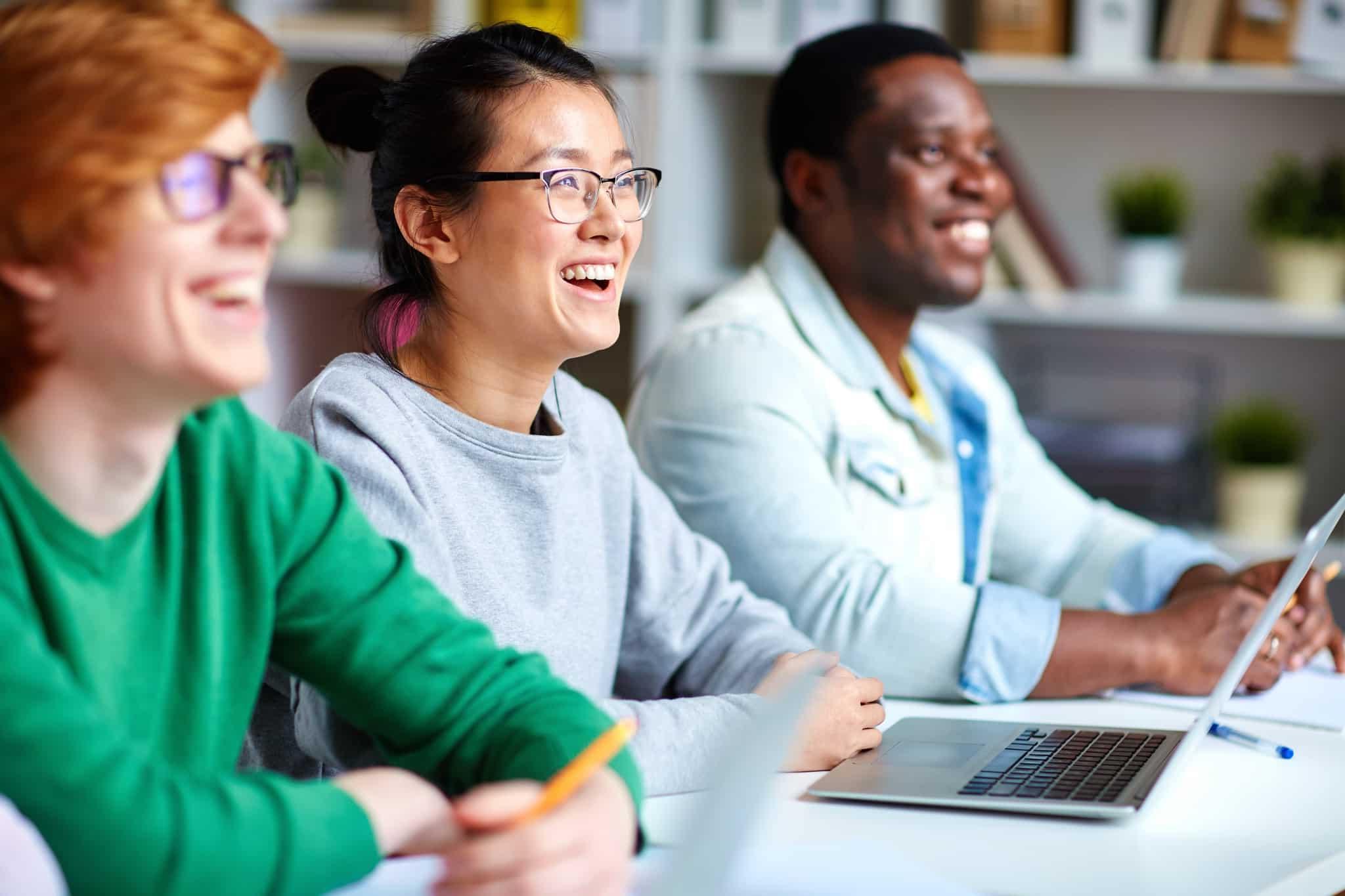 Ecstatic students smiling and laughing